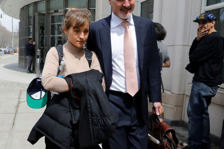 Actress Allison Mack departs the Brooklyn Federal Courthouse after facing charges regarding sex trafficking and racketeering related to the Nxivm cult case in New York, U.S., April 8, 2019. REUTERS/Shannon Stapleton