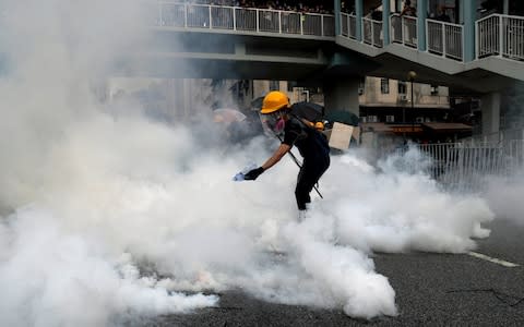 Demonstrators march to protest against the Yuen Long attacks in Yuen Long - Credit: REUTERS/Tyrone Siu