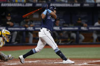 Tampa Bay Rays' Jonathan Aranda watches his RBI single in his first at-bat in the majors, against the Pittsburgh Pirates during the second inning of a baseball game Friday, June 24, 2022, in St. Petersburg, Fla. (AP Photo/Scott Audette)