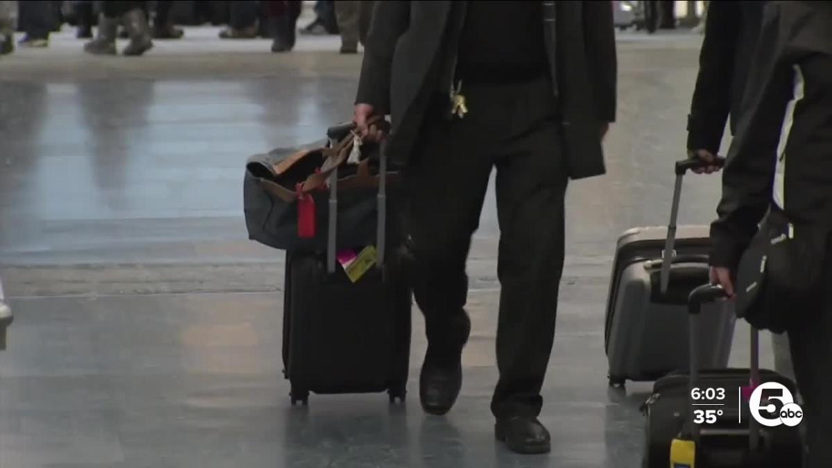 Travelers pack Cleveland Hopkins Airport ahead of the holiday weekend