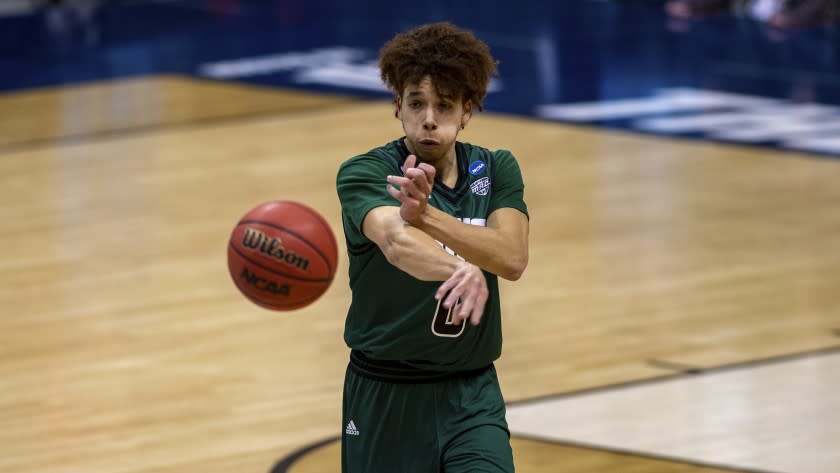 Ohio guard Jason Preston (0) in a first-round game against Virginia in the NCAA men's college basketball tournament, Saturday, March 20, 2021, at Assembly Hall in Bloomington, Ind. (AP Photo/Doug McSchooler)