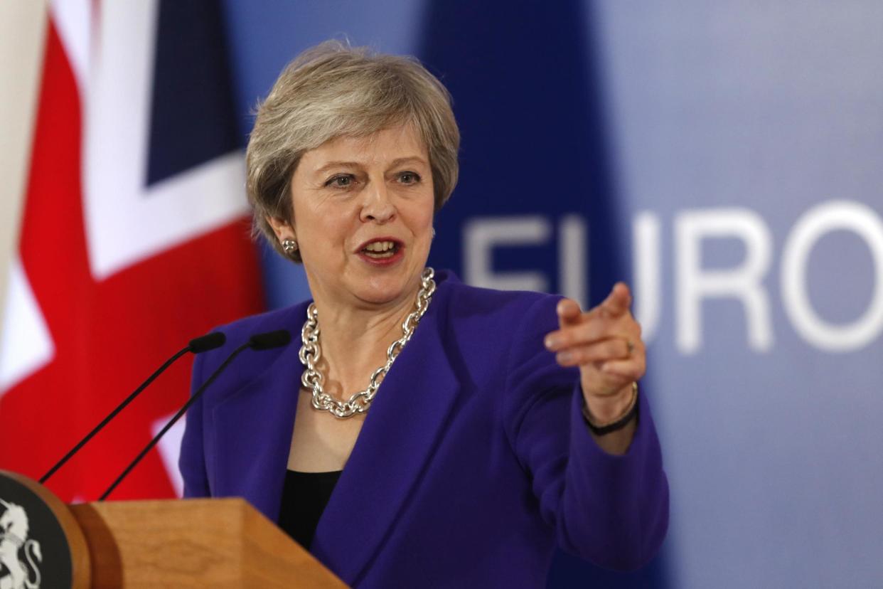 Theresa May speaks during a media conference at an EU summit in Brussels: AP