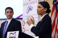 Morgan Harper, right, a progressive Democrat running for an open U.S. Senate seat in Ohio, speaks during a debate against Josh Mandel, a Republican former Ohio treasurer, Thursday, Jan. 27, 2022, in Columbus, Ohio. (AP Photo/Jay LaPrete)