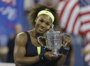 FILE - Serena Williams holds the championship trophy after beating Victoria Azarenka, of Belarus, in the championship match at the 2012 U.S. Open tennis tournament, Sunday, Sept. 9, 2012, in New York. Serena Williams says she is ready to step away from tennis after winning 23 Grand Slam titles, turning her focus to having another child and her business interests. “I’m turning 41 this month, and something’s got to give,” Williams wrote in an essay released Tuesday, Aug. 9, 2022, by Vogue magazine. (AP Photo/Mike Groll, File)
