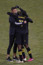 Columbus Crew players celebrate after defeating the Seattle Sounders 3-0 in the MLS Cup championship game Saturday, Dec. 12, 2020, in Columbus, Ohio. (AP Photo/Jay LaPrete)