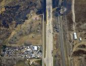 The site of a train derailment near the hamlet of Gainford, west of Edmonton, is seen in an aerial photo October 20, 2013. The Canadian National Railway train carrying petroleum crude oil and liquefied petroleum gas derailed west of Edmonton, Alberta, the Transportation Safety Board of Canada said on October 19. REUTERS/Dan Riedlhuber (CANADA - Tags: DISASTER TRANSPORT)