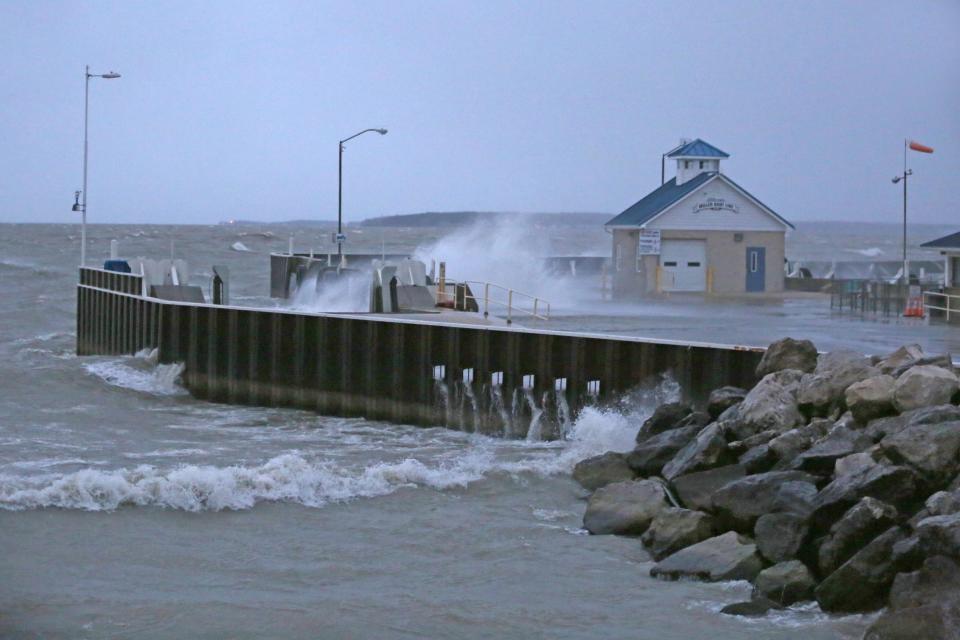 Waves crash at the Miller Boat Line docks on Catawba Island on Monday evening. Gale force winds out of the northwest brought 4-7 foot waves along the Lake Erie shoreline in Ottawa County.