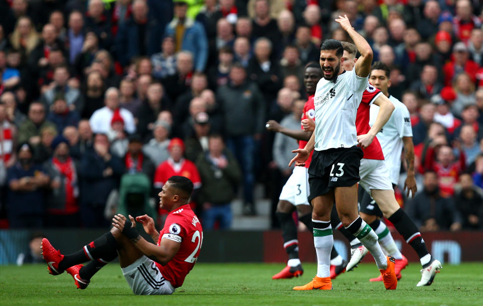 <p>Manchester United’s Antonio Valencia reacts to a challenge </p>