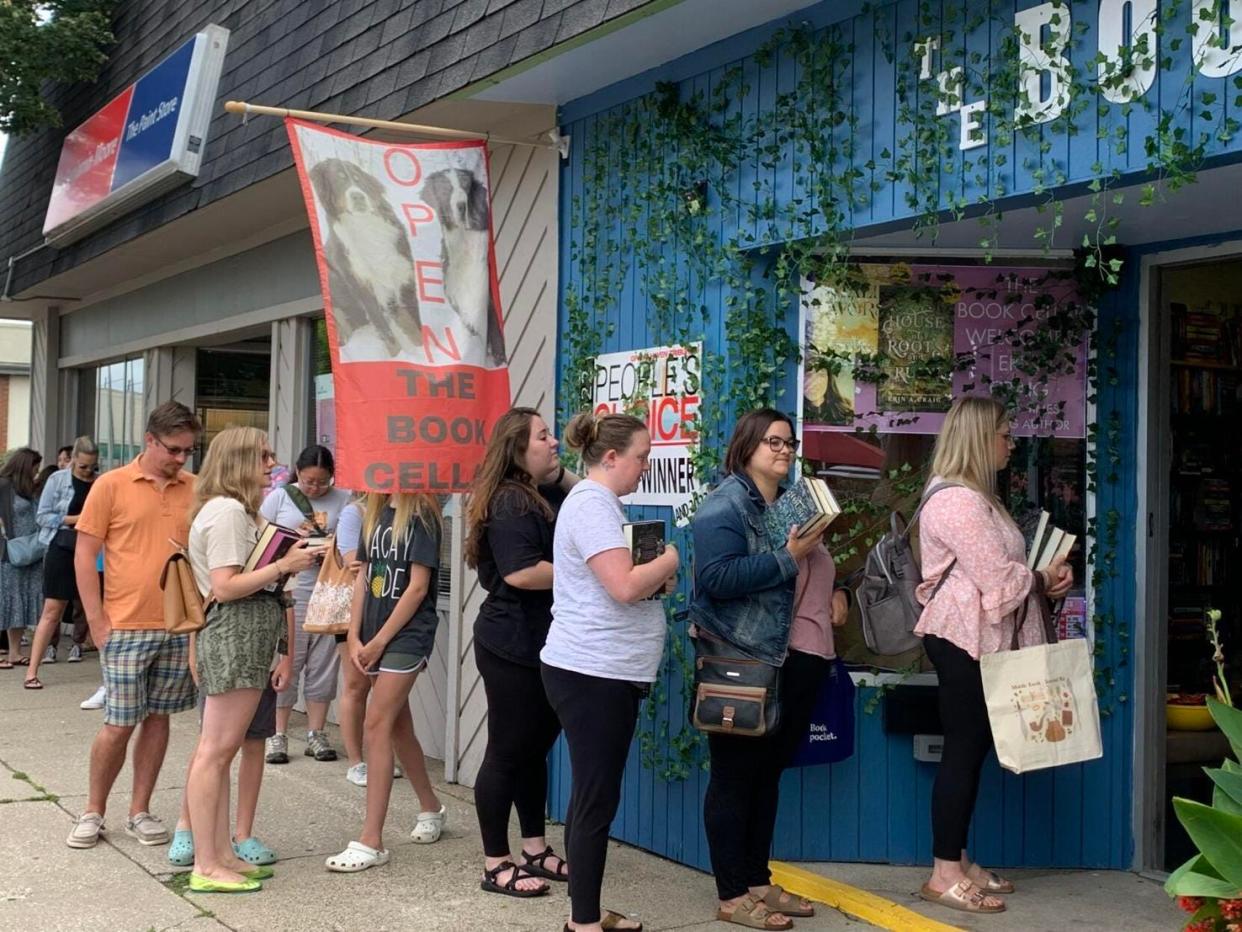 People line up outside The Book Cellar in Grand Haven on Saturday, Aug. 26, eager to meet author Erin Craig.