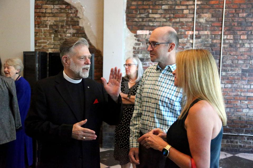 Rev. William Willoughby III talks with guests during his retirement gathering at Soho South on Wednesday April 26, 2023. 