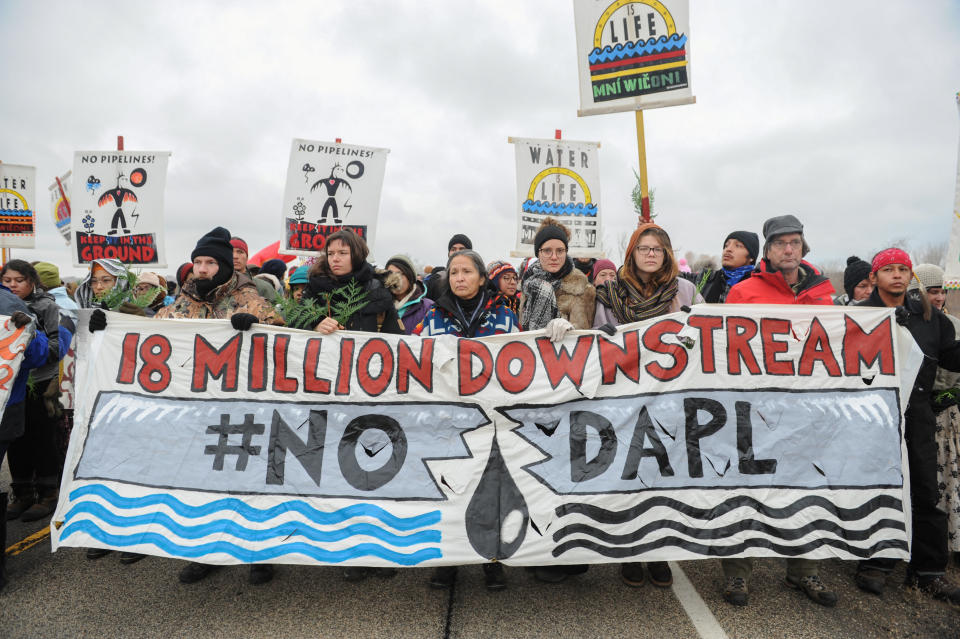 Protesters block highway 1806 in Mandan during a protest against plans to pass the Dakota Access pipeline near the Standing Rock Indian Reservation, North Dakota, U.S. November 23, 2016. REUTERS/Stephanie Keith