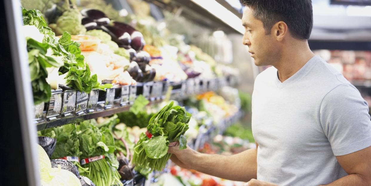 hispanic man shopping for produce