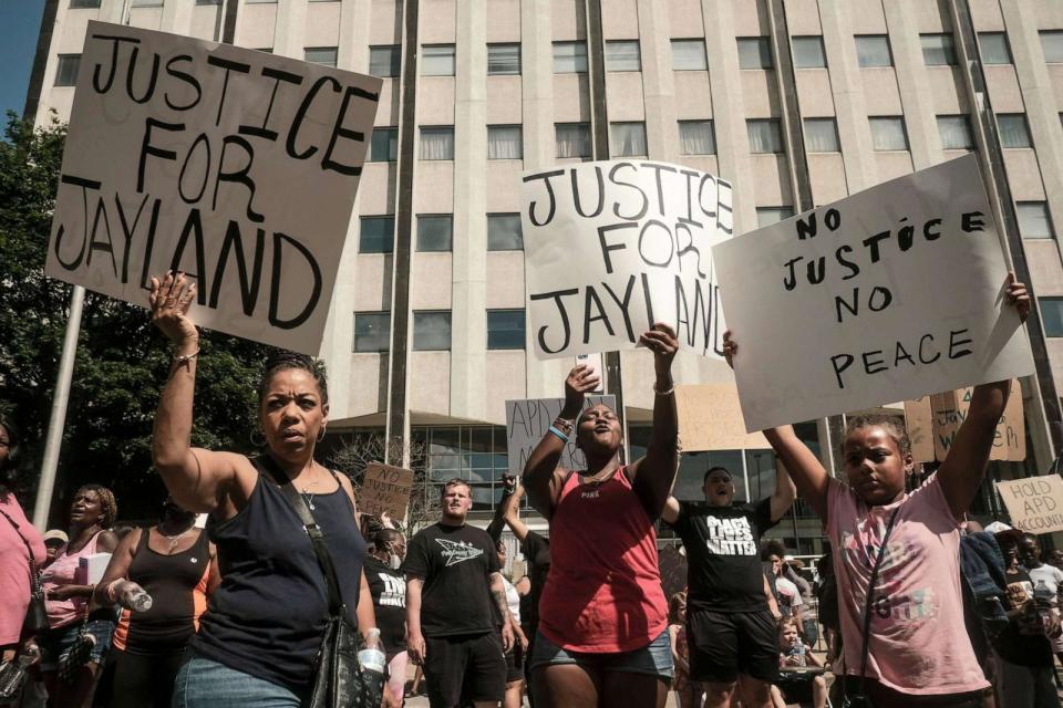 PHOTO: Demonstrators hold 'Justice for Jayland' signs as they gather outside Akron City Hall to protest the killing of Jayland Walker, shot by police, in Akron, Ohio, July 3, 2022. (Matthew Hatcher/AFP via Getty Images, FILE)