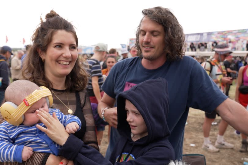 Baby Finlay, mother Rosie, sister Sofia and father Tom at Glastonbury Festival