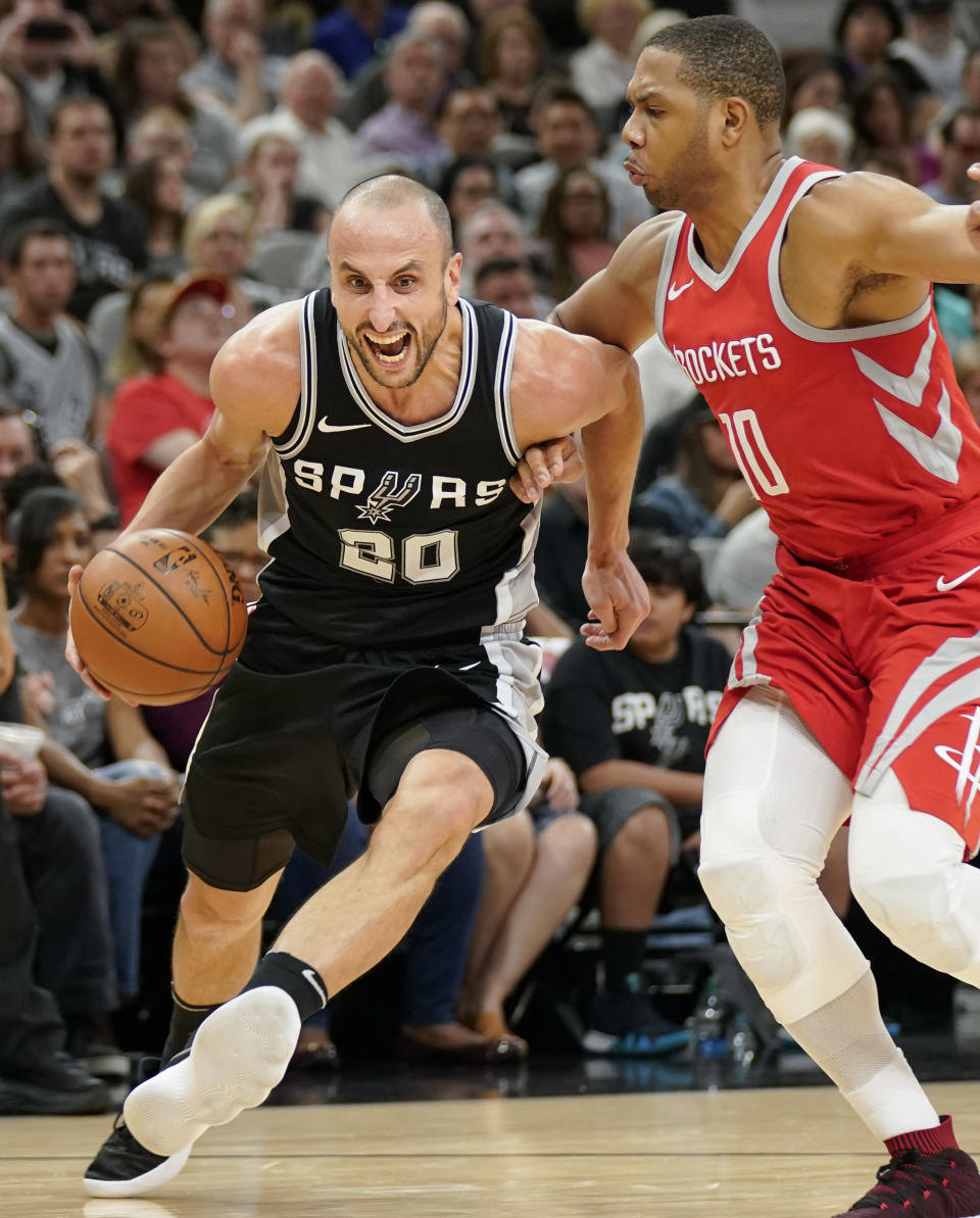 FILE - In this April 1, 2018, file photo, San Antonio Spurs' Manu Ginobili (20) drives around Houston Rockets' Eric Gordon during the second half of an NBA basketball game, in San Antonio. Ginobili retired at age 41 Monday after a "fabulous journey" in which he helped the San Antonio Spurs win four NBA championships in 16 seasons with the club. (AP Photo/Darren Abate, File)