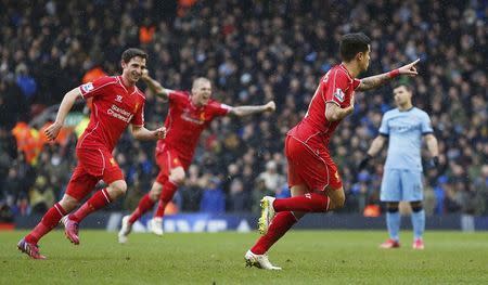 Liverpool's Philippe Coutinho celebrates after scoring the second goal for his side. Liverpool v Manchester City - Barclays Premier League - Anfield - 1/3/15. Reuters / Phil Noble Livepic