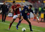 Soccer Football - CAF Champions League - Semi-Final - Al Ahly vs Etoile du Sahel - Borg El Arab Stadium, Borg El Arab, Egypt - October 22, 2017 Al Ahly's Walid Azaro in action with Etoile du Sahel's Hamdi Nagguez REUTERS/Amr Dalsh