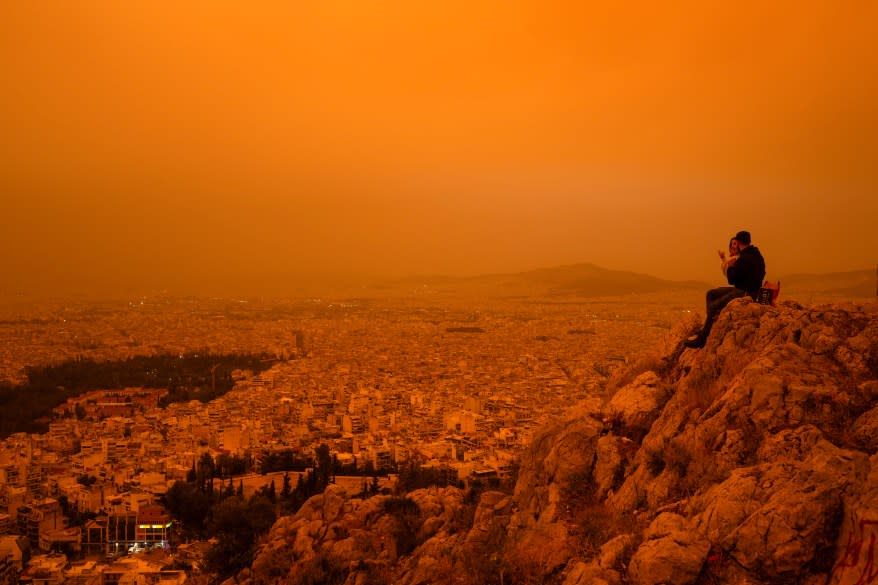 A dust cloud from the Sahara Desert in Africa covers the Acropolis on April 23, 2024 in Athens, Greece.