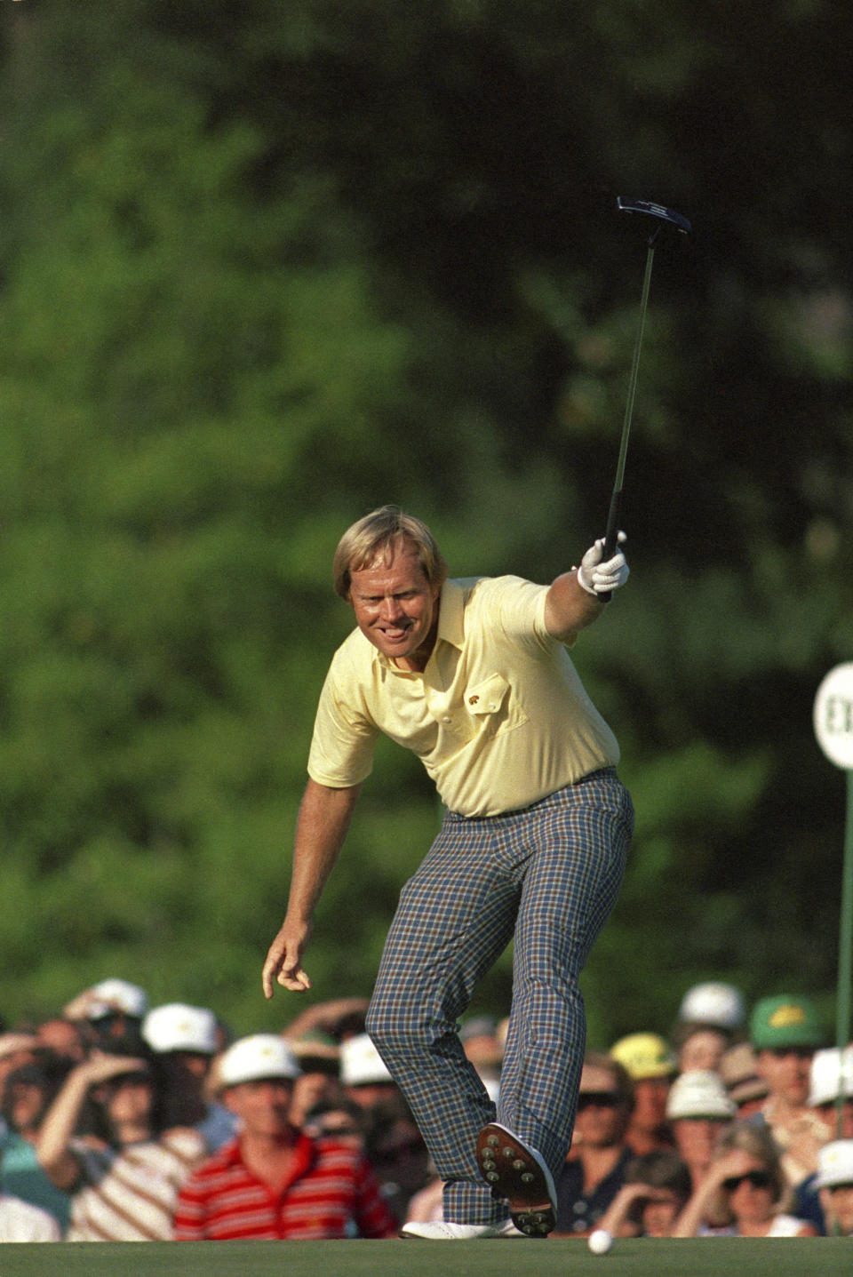 FILE - In this April 13, 1986, file photo, Jack Nicklaus watches his putt drop for a birdie on the 17th hole during the Masters golf tournament at Augusta National in Augusta, Ga. Nicklaus turns 80 on Tuesday, Jan. 21, 2020, and still remains a big part of golf conversations. (AP Photo/Phil Sandlin, File)