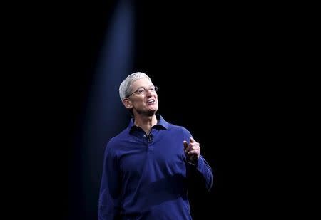 Apple CEO Tim Cook gestures as he delivers his keynote address at the Worldwide Developers Conference in San Francisco, California June 8, 2015. REUTERS/Robert Galbraith