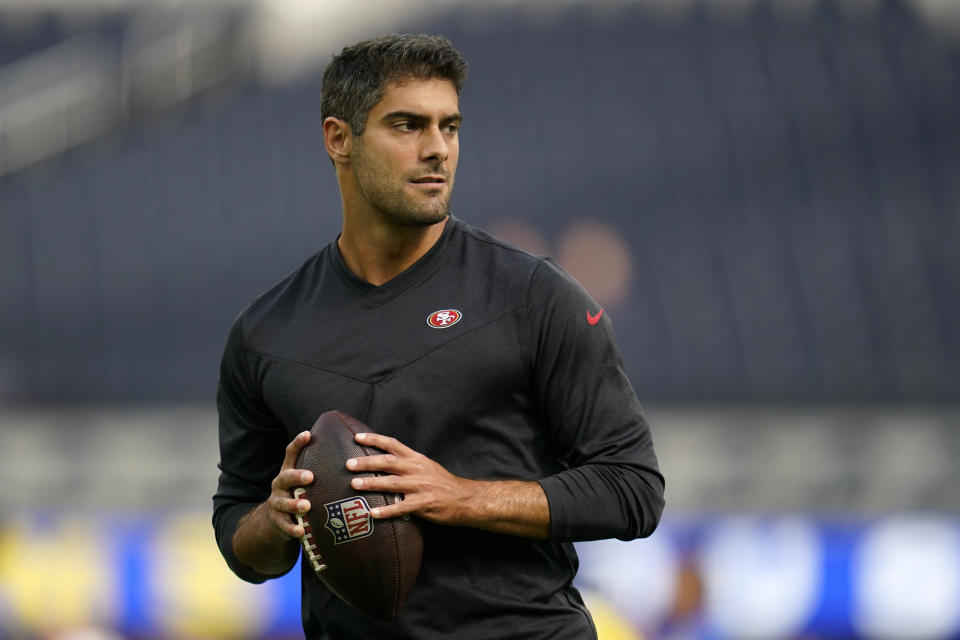 FILE - San Francisco 49ers quarterback Jimmy Garoppolo warms up prior to an NFL football game against the Los Angeles Rams on Oct. 30, 2022, in Inglewood, Calif. Garoppolo has agreed to a three-year, $67.5 million contract with the Las Vegas Raiders, according to a person with knowledge of the deal. The person spoke on condition of anonymity because the deal can’t be announced until Wednesday, March 15, 2023. (AP Photo/Ashley Landis, File)