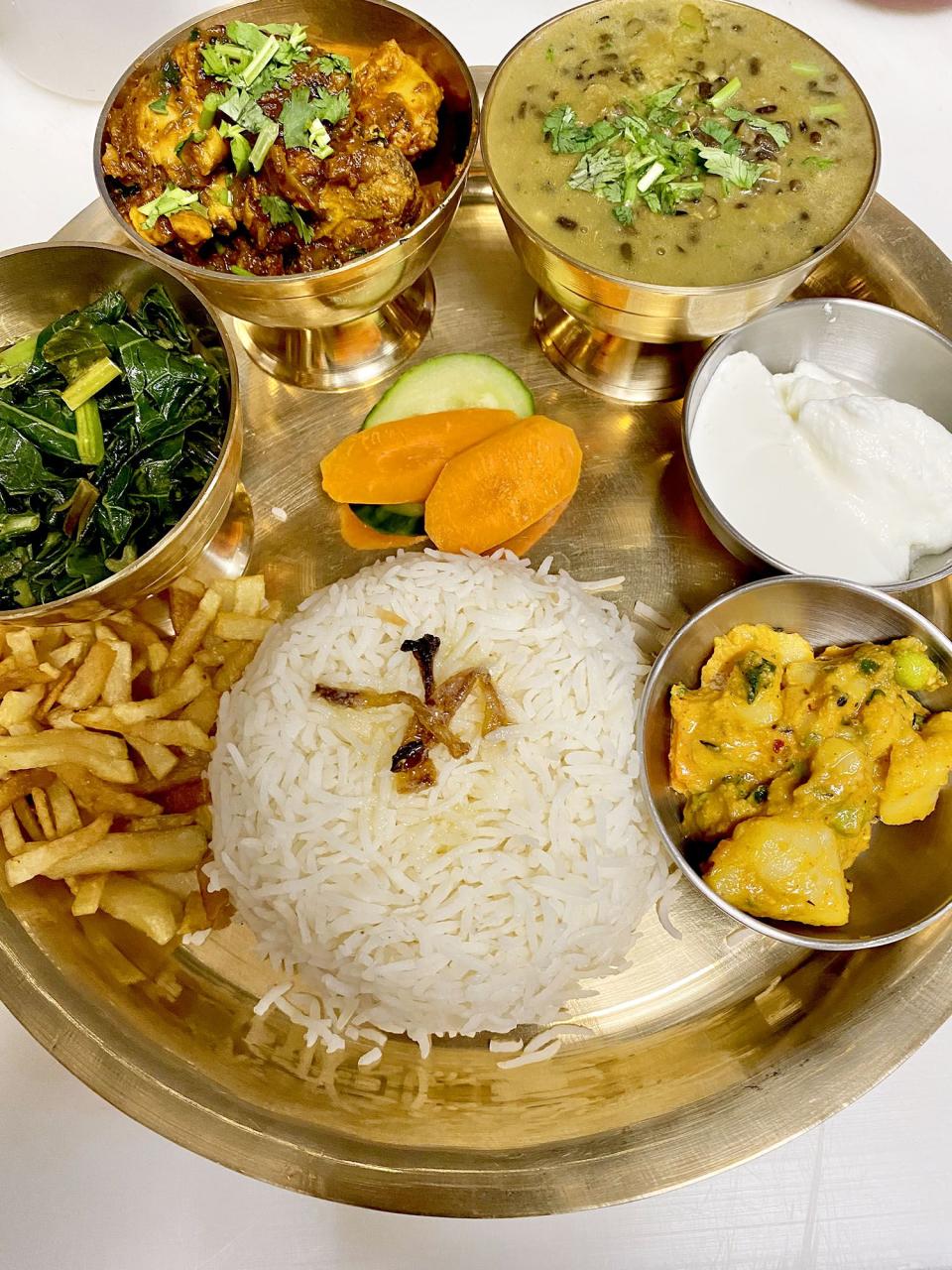 Take the short drive from downtown for a taste of Himalayan cuisine at Gorkhali Kitchen. The menu is large with a Nepalese focus along with some Indian elements. Of course, there must be momo, those iconic Nepalese dumplings that are seared, pan-fried or even in jhol (soup). Chicken is a popular protein that appears often on the menu, but don't shy away from the goat specialties. They're falling-off-the-bone tender and savory.