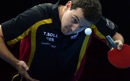 Germany's Timo Boll serves during the men's team table tennis semifinal China vs Germany of the London 2012 Olympic Games in London. Olympic champion Zhang Jike suffered a shock defeat as China survived a couple of unexpected wobbles before beating Germany 3-1 to reach the final of the men's team event on Monday