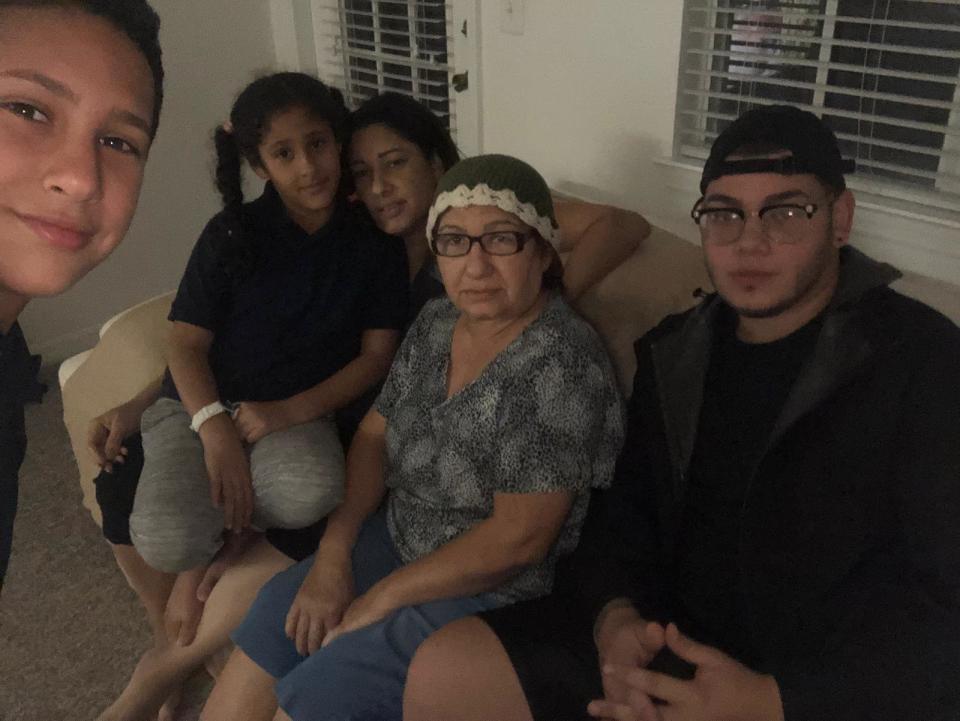 Amneris Ortiz, her mother and three kids in their rental apartment (Photo: Amneris Ortiz)