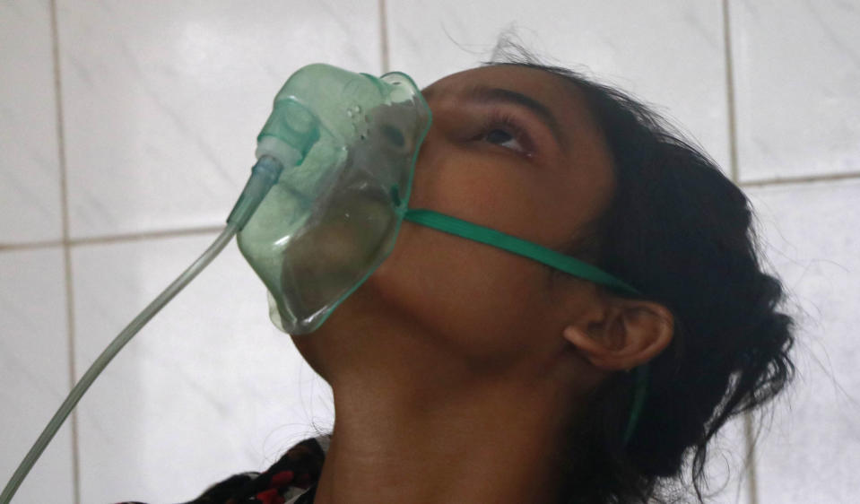 A patient receives oxygen at the Medical College Hospital in Rajshahi, 254 kilometers (158 miles) north of the capital, Dhaka, Bangladesh, June 16, 2021. Rajshahi has become one of the latest hotspots for the deadlier delta variant of the coronavirus. Bangladeshi authorities are increasingly becoming worried over the quick spread of coronavirus in about two dozen border districts close to India amid concern that the virus could devastate the crowded nation in coming weeks. (AP Photo/ Kabir Tuhin)