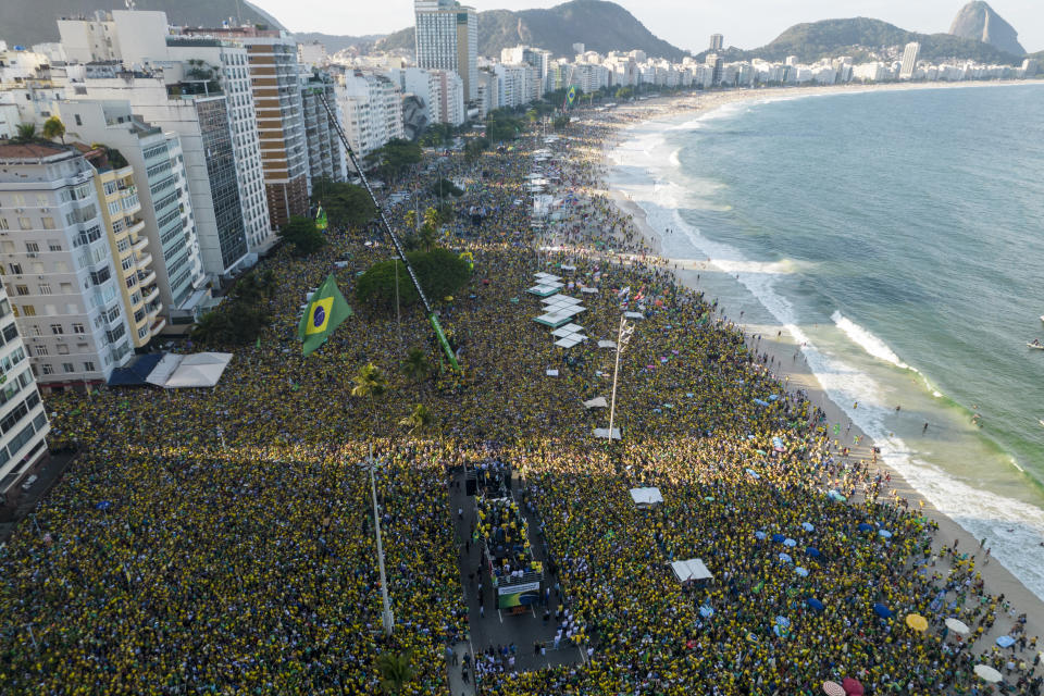 Supports of President Jair Bolsonaro gather in Copacabana beach during the independence bicentennial celebrations in Rio de Janeiro, Brazil, Wednesday, Sept. 7, 2022. (AP Photo/Rodrigo Abd)