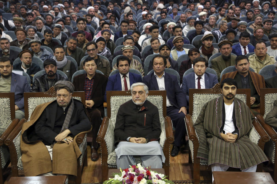 Afghan presidential candidate Abdullah Abdullah, front center, attends at a gathering in Kabul, Afghanistan, Sunday, Nov. 10, 2019. Abdullah has unilaterally withdrawn his team's election observers from an official recount of ballots ahead of long-delayed election results. (AP Photo/Rahmat Gul)
