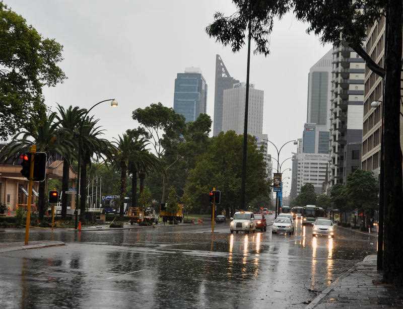 St Georges Terrace is inundated with rain following a storm in Perth.