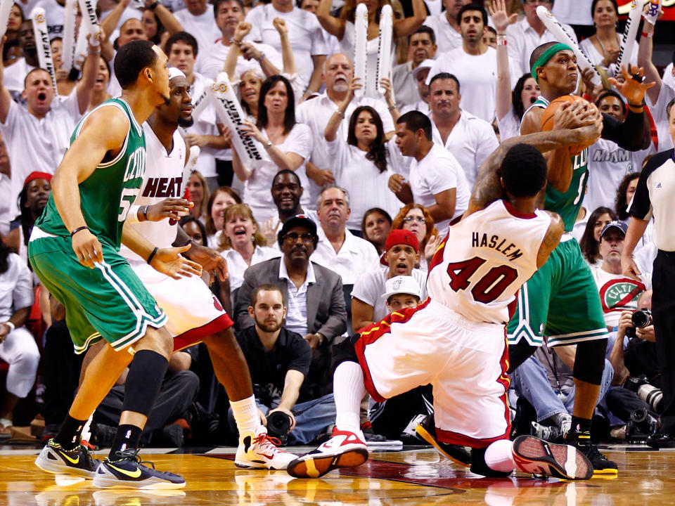 MIAMI, FL - JUNE 09: Rajon Rondo #9 of the Boston Celtics and Udonis Haslem #40 of the Miami Heat battle for the ball in the second half in Game Seven of the Eastern Conference Finals in the 2012 NBA Playoffs on June 9, 2012 at American Airlines Arena in Miami, Florida. (Photo by Mike Ehrmann/Getty Images)