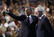 FILE - In this Wednesday, Sept. 5, 2012 file photo, President Barack Obama embraces former President Bill Clinton after Clinton addressed the Democratic National Convention in Charlotte, N.C. In 2008, Obama became the first Democrat to take North Carolina since Jimmy Carter in 1976. Pundits called the victory historic, but it came by the slimmest of margins - just 14,000 votes out of nearly 4.4 million cast. History suggests that if the economy doesn't show substantial improvement in the year before a presidential election, the incumbent loses. And North Carolina's recovery from the "Great Recession" has lagged behind the nation's. (AP Photo/David Goldman, File)
