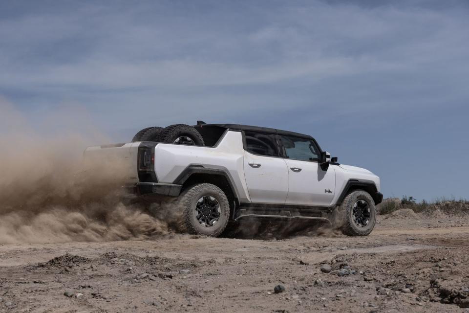 <p>The <a href="https://www.caranddriver.com/gmc/hummer-ev" rel="nofollow noopener" target="_blank" data-ylk="slk:GMC Hummer EV;elm:context_link;itc:0;sec:content-canvas" class="link ">GMC Hummer EV</a> knows how ludicrous of a concept it is (An electric revival of the quintessential gas-guzzler? You must be kidding), and it leans into the bit completely. Heck, GMC dubs truck's launch control setup bears Watts to Freedom (WTF) mode. With it engaged, this 1000-hp, tri-motor behemoth claws its way to 60 mph in 3.3 seconds. If that's not enough for you, then maybe the Hummer's Extract Mode, which raises the truck nearly 16 inches off the ground, or its Crab Walk mode that, thanks to a four-wheel steering system, allows the truck to drive diagonally around obstacles. </p><p>For all its riotous fun, the Hummer EV is spectacularly expensive. Blame the fact it's strictly available in loaded Edition 1 guise for 2022 (cheaper and less powerful variants of the model are due to trickle out over the course of the next couple of model years). </p><p>Its 7500-pound towing capacity is also notably less than those of the other two electric trucks available for 2022. The Hummer is also exceedingly heavy, with an estimated curb weight north of 9000 pounds. Even so, GMC claims the Hummer will travel 329 miles with a full charge of its giant 212.7-kWh battery pack.<br><br></p><ul><li><em>Car and Driver </em>rating: 7.5/10</li><li>Base price: $110,295</li></ul><p><a class="link " href="https://www.caranddriver.com/gmc/hummer-ev/specs" rel="nofollow noopener" target="_blank" data-ylk="slk:MORE HUMMER EV SPECS;elm:context_link;itc:0;sec:content-canvas">MORE HUMMER EV SPECS</a></p>