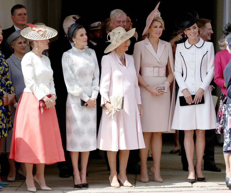 (left to right) Sophie Countess of Wessex, Queen Letizia of Spain, the Duchess of Cornwall, Queen Maxima of the Netherlands and the Duchess of Cambridge, stand together as they watch the annual Order of the Garter Service at St George's Chapel, Windsor Castle.