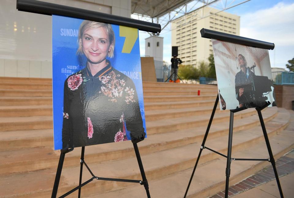 PHOTO: Photos of cinematographer Halyna Hutchins are displayed before a vigil held to honor her, Oct. 23, 2021, in Albuquerque, N.M (Sam Wasson/Getty Images)