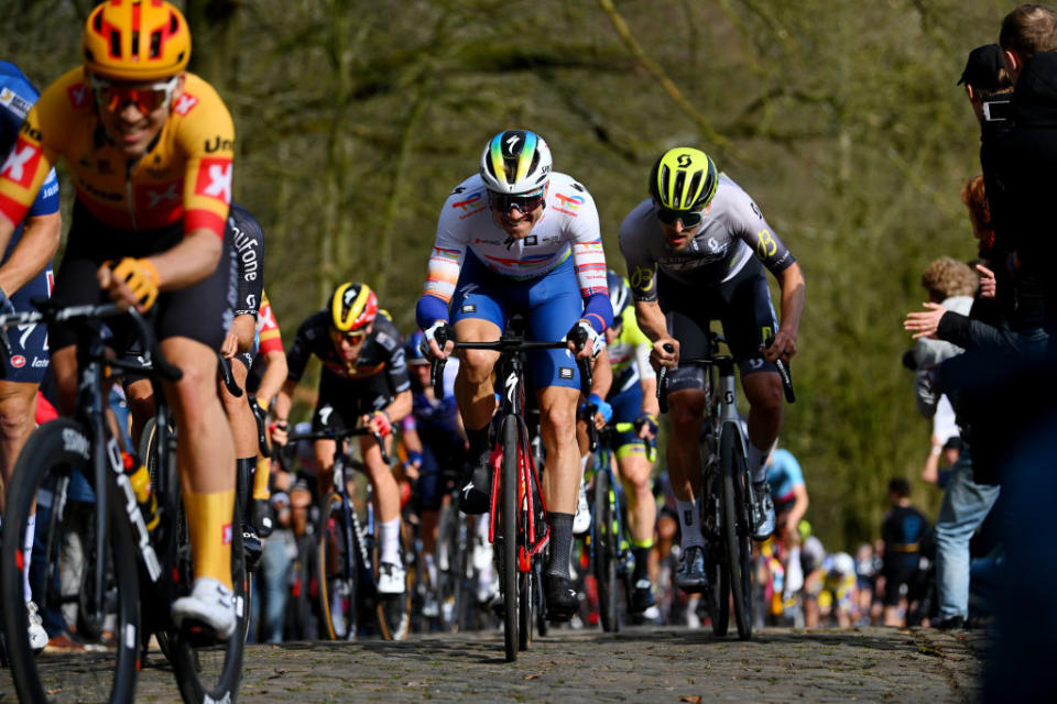 BREDENE BELGIUM  MARCH 17 Edvald BoassonHagen of Norway and Team TotalEnergies competes passing through a Kemmelberg cobblestones sector during the 21th Bredene Koksijde Classic 2023 a 1916km one day race from Bredene to Koksijde on March 17 2023 in Koksijde Belgium Photo by Luc ClaessenGetty Images