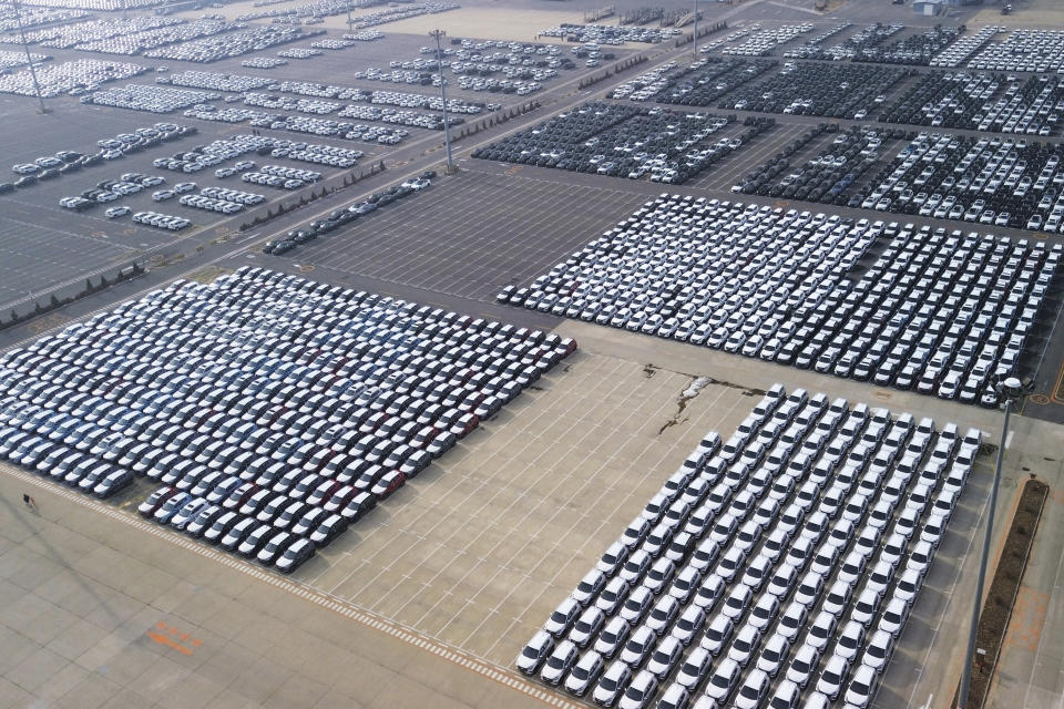 In this photo released by Xinhua News Agency, an aerial drone photo taken on Jan. 16, 2024 shows vehicles at a terminal of Dalian Port, northeast China's Liaoning Province. China's economy for the Oct-Dec quarter grew at a quicker rate, allowing the Chinese government to hit its annual growth target of about 5% for 2023 even as trade and economic recovery remained uneven. (Chen Wei/Xinhua via AP)