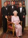 <p>In 2003, the Queen posed for a photo with Prince Philip, Prince Charles, and Prince William in honor of the 50th anniversary of the Queen's coronation. The Queen chose a pale pink dress with dazzling details, worn with a diamond necklace.</p>