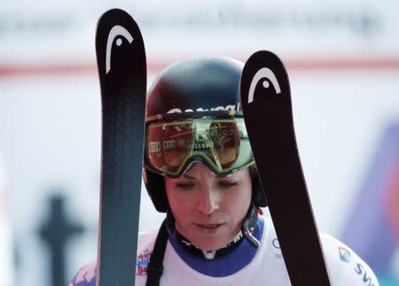 Alpine Skiing - FIS Alpine Skiing World Cup - Women's Alpine Super G - St. Moritz, Switzerland - December 9, 2017 - Lara Gut of Switzerland reacts at the finish line after crashing on the course. REUTERS/Arnd Wiegmann