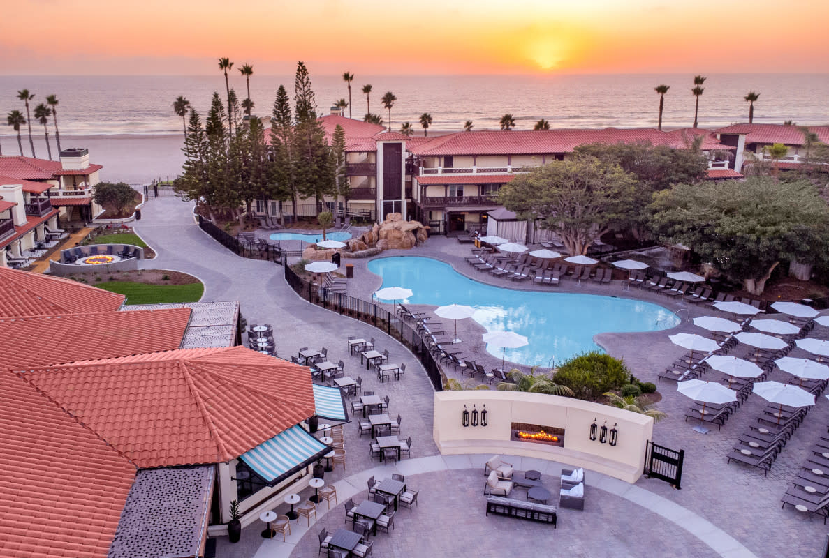 Sunset at Zachari Dunes on Mandalay Beach<p>Courtesy of Zachari Dunes on Mandalay Beach, Curio Collection by Hilton</p>