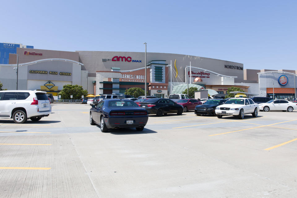 HOUSTON, May 5, 2020 -- Cars are parked in front of a shopping mall in Frisco, on the outskirts of Dallas, Texas, the United States, May 5, 2020. After closed for several weeks due to the outbreak of COVID-19 pandemic, the shopping mall reopened with shortened business hours on Tuesday. (Photo by Dan Tian/Xinhua via Getty) (Xinhua/ via Getty Images)