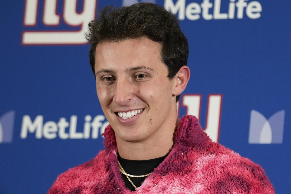 New York Giants quarterback Tommy DeVito (15) answers questions during a news conference after playing against the Green Bay Packers in an NFL football game, Monday, Dec. 11, 2023, in East Rutherford, N.J. (AP Photo/Seth Wenig)