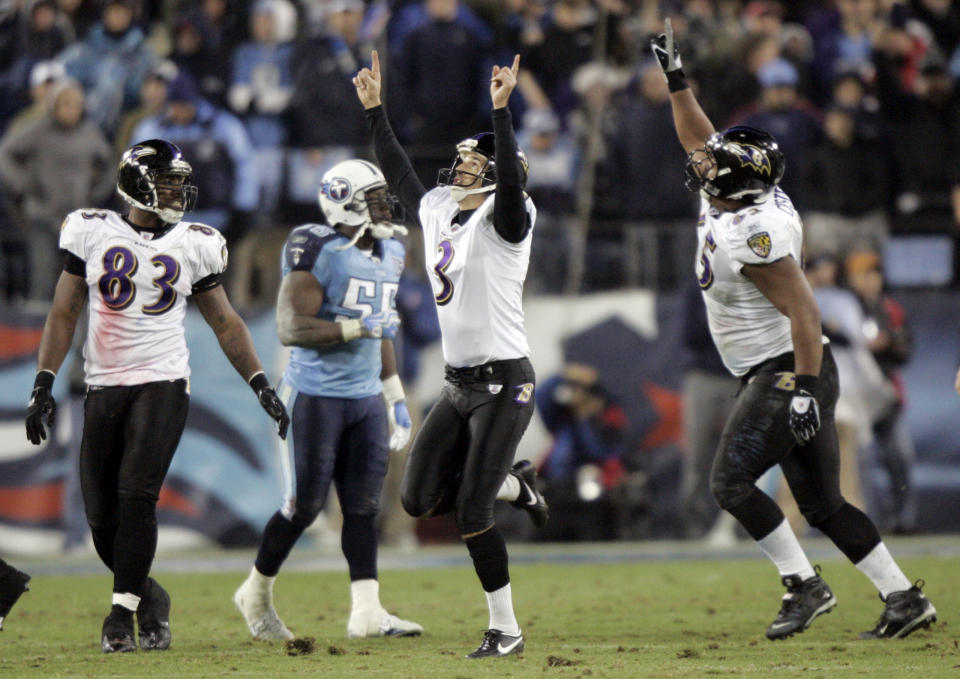 FILE - In this Jan. 10, 2009, file photo, Baltimore Ravens' Matt Stover (3) celebrates as Tennessee Titans linebacker Stephen Tulloch (55) walks away after Stover kicked a 43-yard field goal with 53 seconds left in the fourth quarter to give the Ravens a 13-10 win in an NFL football divisional playoff game in Nashville, Tenn. At left is Ravens tight end Daniel Wilcox (83) and at right is center Chris Chester. The Titans playing the Ravens in the divisional round on Saturday night, Jan. 11, has revived strong memories of a very intense and bitter playoff rivalry along with the agony of possible Super Bowl titles lost. (AP Photo/Wade Payne, File)