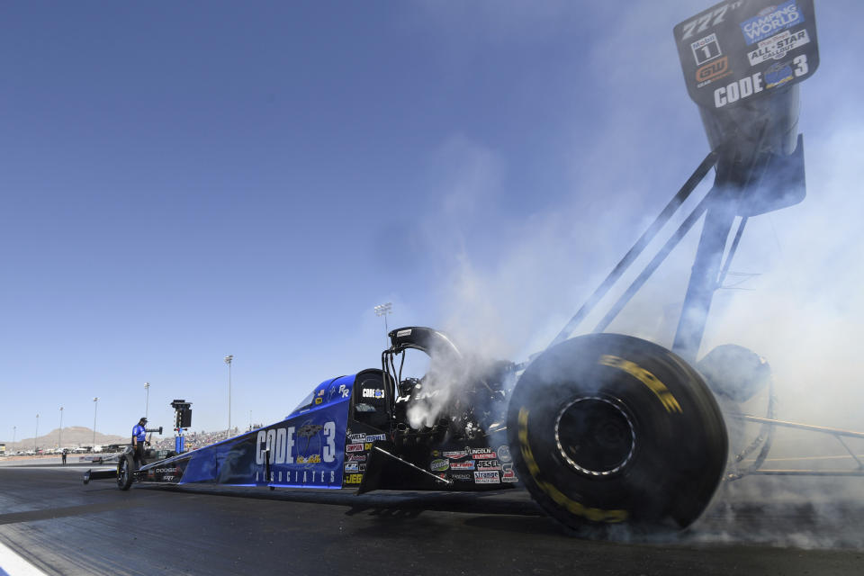 In this photo provided by the NHRA, Leah Pruett drives in Top Fuel qualifying for the NHRA Four-Wide Nationals drag races Friday, April 1, 2022, at Las Vegas Motor Speedway in Las Vegas. (Marc Gewertz/NHRA via AP)