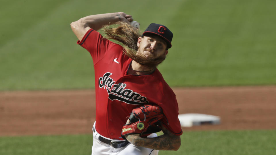 Cleveland Indians starting pitcher Mike Clevinger delivers in the first inning in a baseball game against the Kansas City Royals, Saturday, July 25, 2020, in Cleveland. (AP Photo/Tony Dejak)