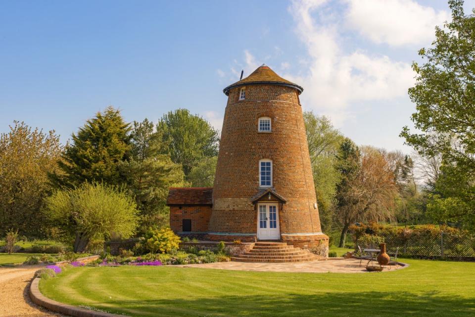 The five-storey, two-bedroom windmill has been used as a successful holiday let (Savills)
