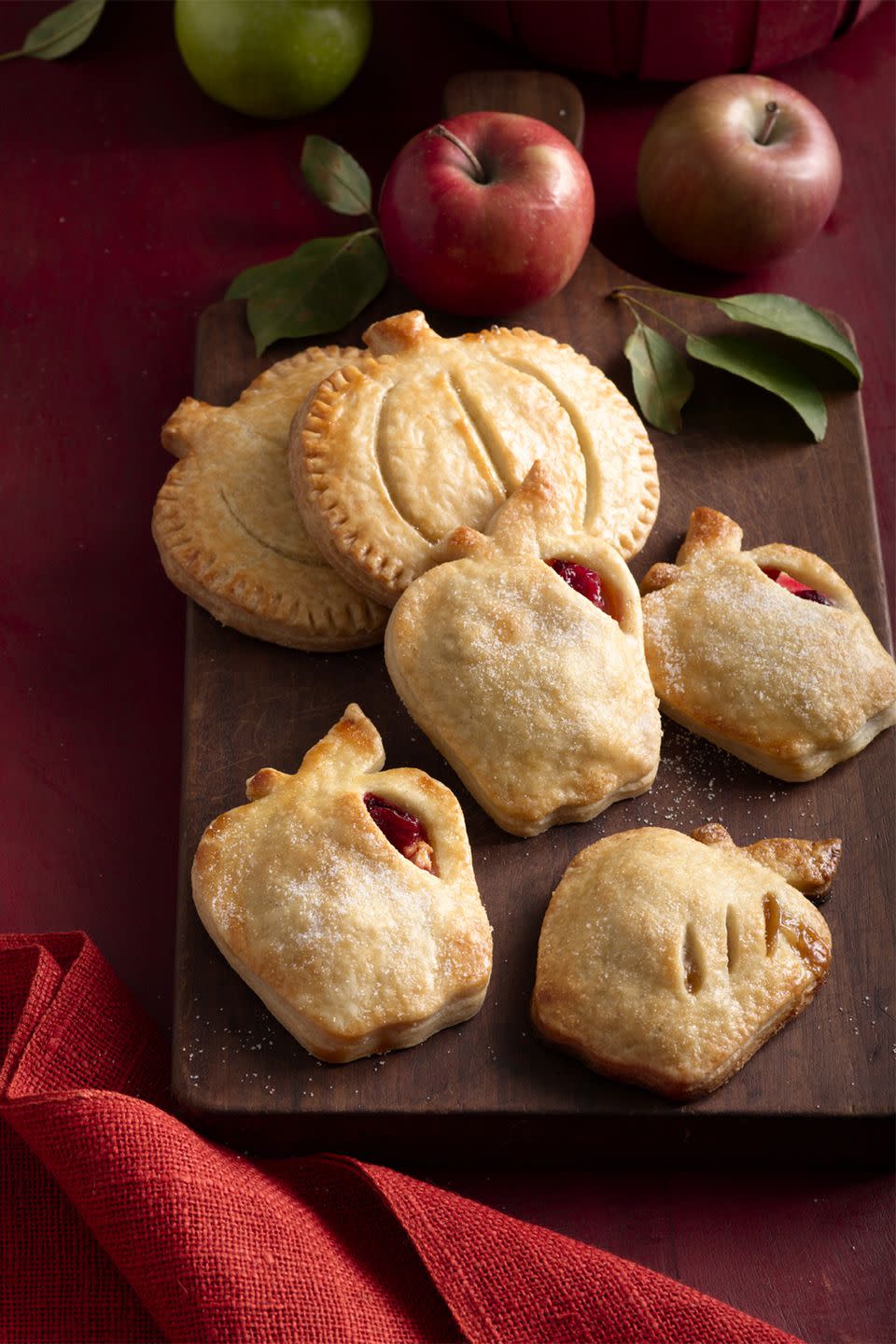 <p>These mini apple and cranberry pies are sure to put a smile on everyone's face this season.</p><p><strong><a rel="nofollow noopener" href="https://www.womansday.com/food-recipes/food-drinks/recipes/a60186/apple-cranberry-hand-pies/" target="_blank" data-ylk="slk:Get the recipe;elm:context_link;itc:0;sec:content-canvas" class="link ">Get the recipe</a>.</strong><br></p>