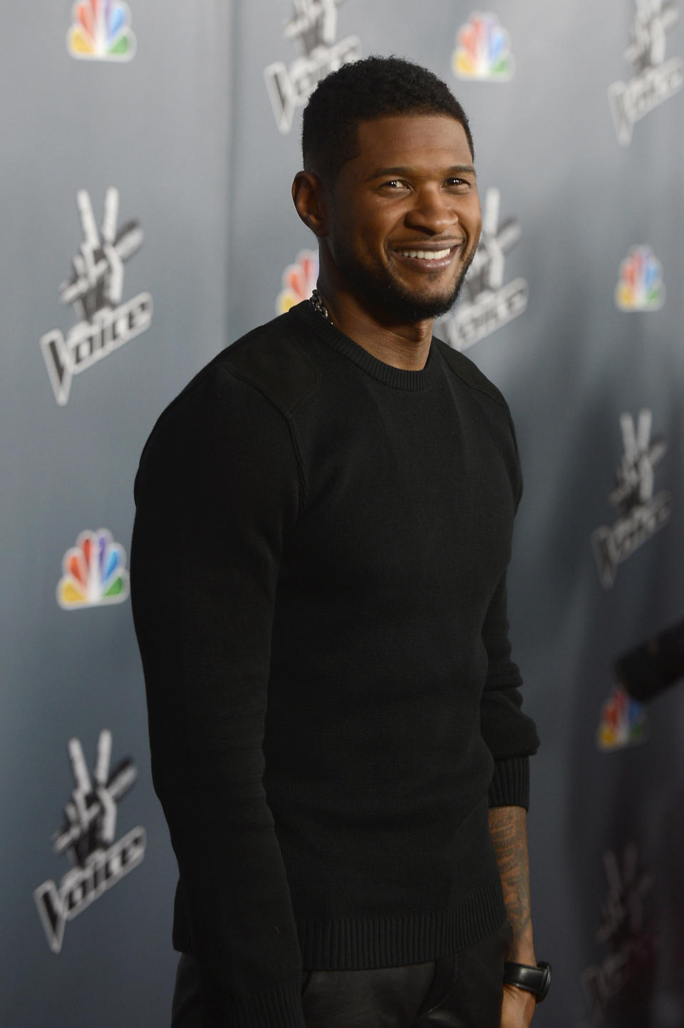 HOLLYWOOD, CA - MARCH 20:  Singer Usher arrives at the screening of NBC's 'The Voice' Season 4 at TCL Chinese Theatre on March 20, 2013 in Hollywood, California.  (Photo by Kevin Winter/Getty Images)